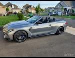 2024 BMW M4 Convertible (top down) driveway2.jpg